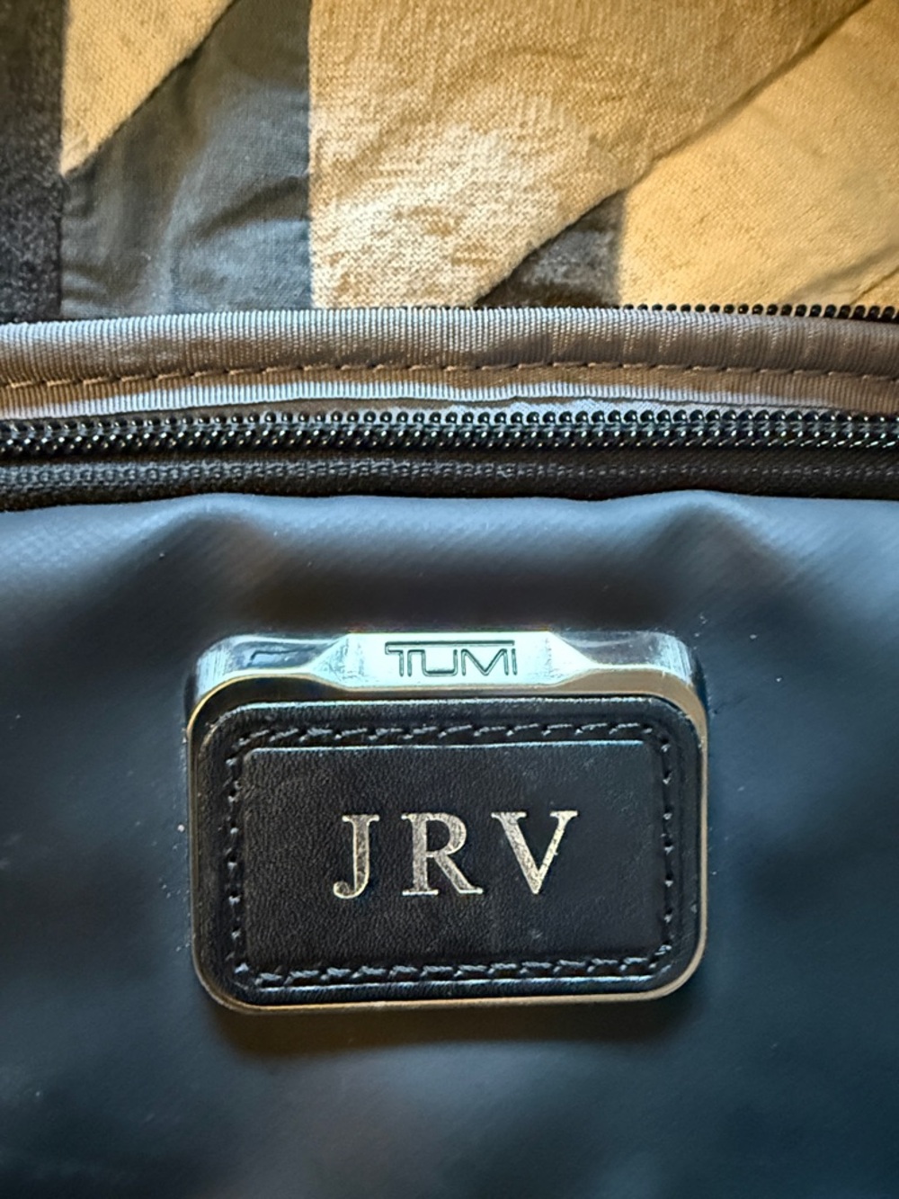 Tumi Black Travel Organizer with Metal and Leather Monogram Plate.